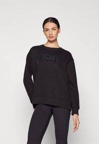 DKNY VARSITY APPLIQUE LOGO LONG LINE CREW NECK PULLOVER - Sweatshirt - black