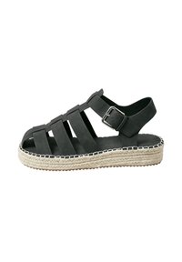 Sandalo espadrilles in suede nero con punta aperta, design a più cinturini, fibbia regolabile e piattaforma in juta intrecciata con bordo decorativo.