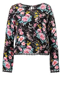 Top lungo a maniche nere con fiori rosa e blu. Presenta un orlo sagomato e una chiusura con lacci sul collo. Tessuto leggero.