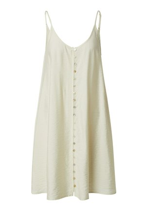 Licht crèmekleurig mouwloos jurkje met een relaxte pasvorm, voorzien van een knoopsluiting aan de voorkant en een zachte, structuurstof. Uitlopende silhouet.