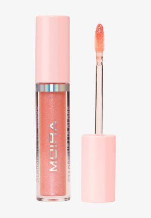 Lip gloss tube with a pink cap and clear container showing shimmery coral gloss, beside a wand applicator coated in the same gloss.