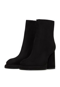 Black suede ankle boots with a rounded toe, high block heel, and a smooth texture. Side zipper detail for easy wear.