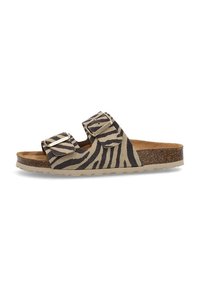 Sandalia plana con parte superior de ante con estampado de cebra, dos correas ajustables, intersuela de corcho y suela de goma. Colores en marrón, negro y beige.