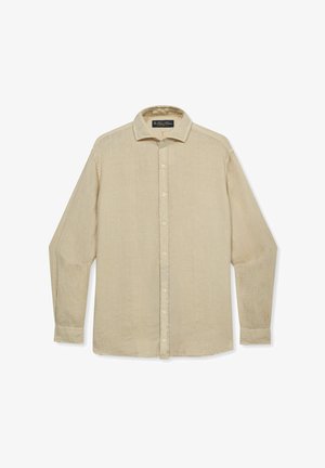 Chemise beige à manches longues avec col et poignets, en tissu léger, étalée à plat sur un fond blanc.
