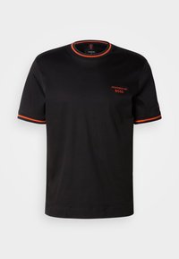 TAUT - T-shirts - black