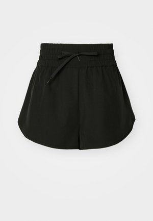 Schwarze Sport Shorts mit einem gerafften elastischen Bund und verstellbarem Kordelzug, einem ausgestellten Design und glatter Stoffstruktur.