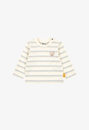 Long-sleeve shirt in cream cotton with pastel blue and pink stripes. Features a bear applique on the chest and a side label tag.