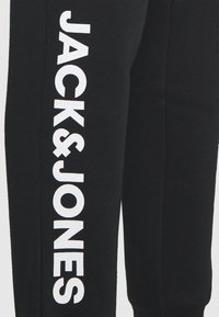 Jack & Jones JJIGORDON SIDE PANTS - Donji dijelovi trenirke - black