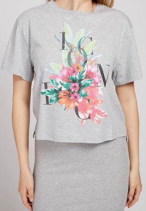 Gray, short-sleeved, crop t-shirt featuring a colorful floral design and bold lettering. Soft cotton material with a relaxed fit.