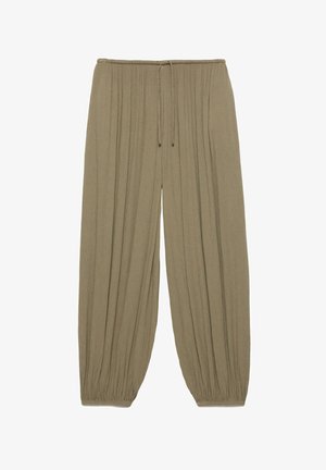 Világosbarna, bőszárú nadrág rugalmas derékpánttal, húzózsinórral és összegyűrt mandzsettákkal a bokáknál.