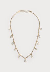 Gold chain necklace with alternating clear teardrop and round crystal charms on a white background.