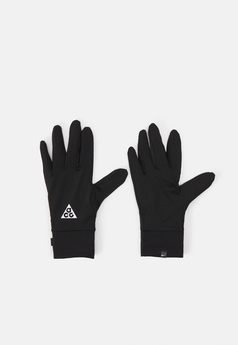 Black gloves made of a smooth, stretchy material. They feature a triangular white logo and snug cuffs for comfort and ease of wear.