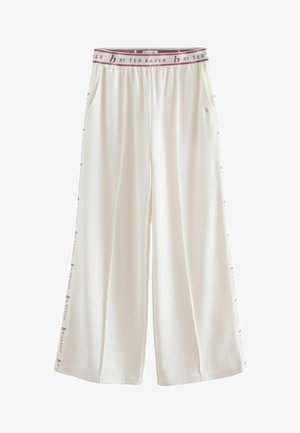 Białe spodnie z szerokimi nogawkami o miękkiej fakturze, z bocznymi kieszeniami i markowym elastycznym paskiem w talii z logo "B by Ted Baker."