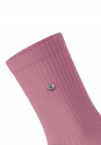 Ribbed pink sock with a textured surface and a silver metallic button accent near the top.