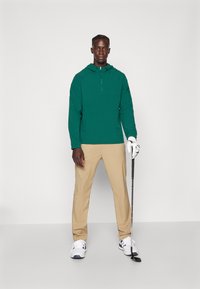 adidas Golf ULTIMATE365 - Neperpučiamoji striukė - green