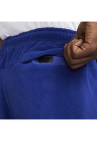 Nike Sportswear AIR WINTER PANT - Cargo trousers - deep royal blue/white