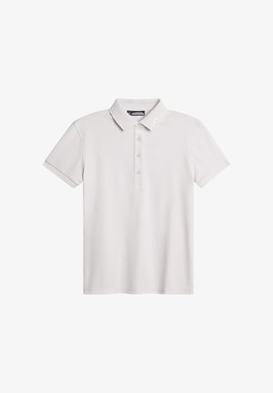 Harmaa polo-paita, lyhyet hihat, klassinen kaulus, kaksi nappia, hillitty logo olkapäällä, sileä rakenne.