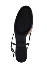 Crne ravne cipele s glatkim gumenim potplatom, s gornjim dijelom u svijetlo bež boji, tankim trakama i logotipom na potplatu.