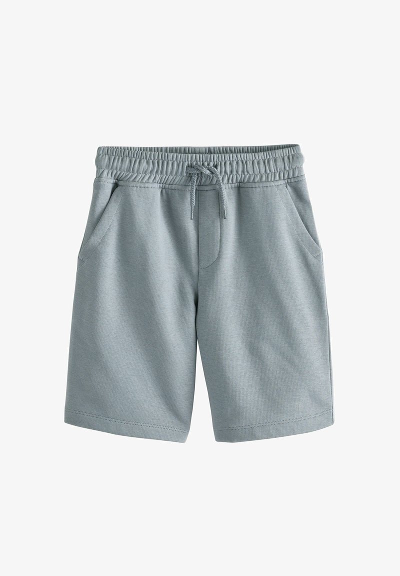 Lyseblå sportsshorts lavet af blødt materiale, med en elastisk talje og snor samt sidelommer. Tyndt stof, knælang.
