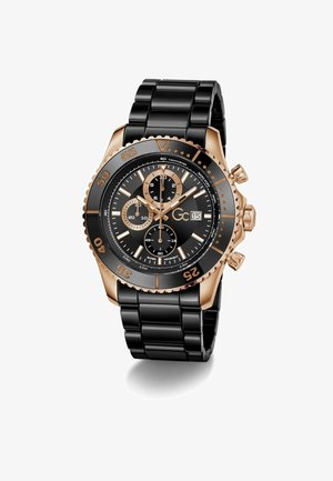 Schwarze Edelstahl-Uhr mit einer vergoldeten Lünette, schwarzem Zifferblatt, drei Unterzifferblättern und einem Gliederarmband-Design. Mit auffälligen Stundenmarkierungen.