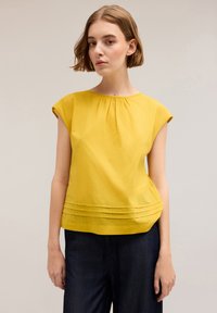 Unselected, giallo