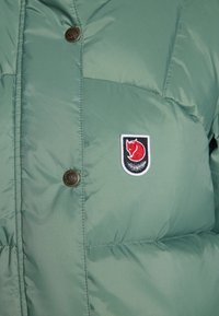 Fjällräven EXPEDITION DOWN LITE JACKET W - Gewatteerde jas - patina green/mustard yellow