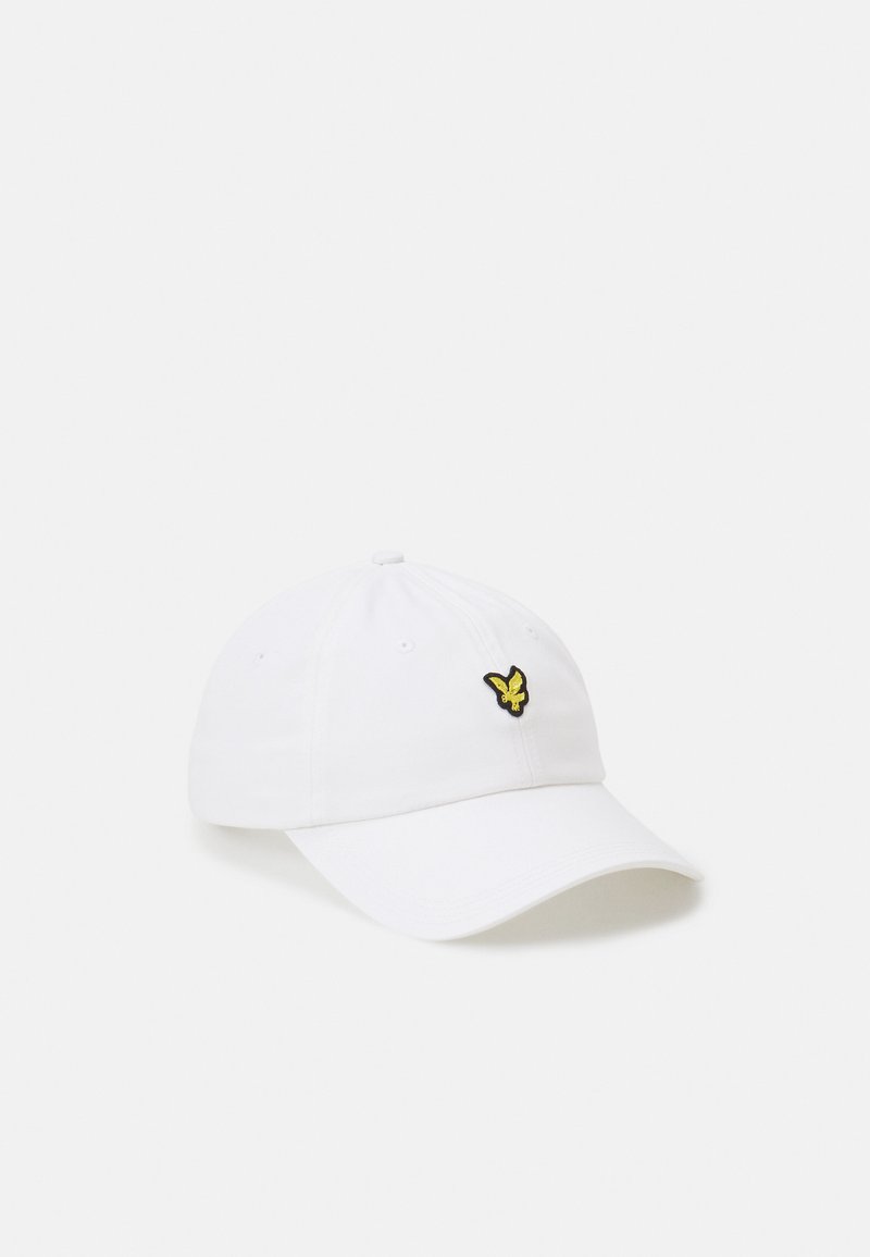 White cotton cap featuring a small black and yellow butterfly emblem on the front. Soft fabric with a curved brim and adjustable strap.