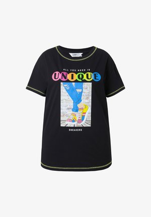 Black cotton t-shirt with short sleeves, featuring a colorful graphic print and contrasting neon stitching. Text reads "ALL YOU NEED IS UNIQUE."