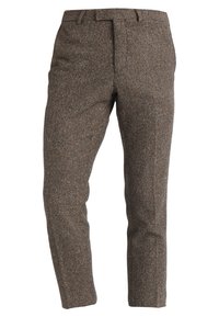 Brown houndstooth patterned trousers with a tapered fit, made from textured fabric. Features a flat front and standard belt loops.