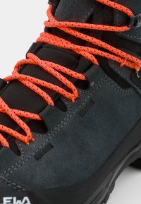 Black suede hiking boot with orange patterned laces. Features reinforced eyelets and a textured black rubber sole for grip.