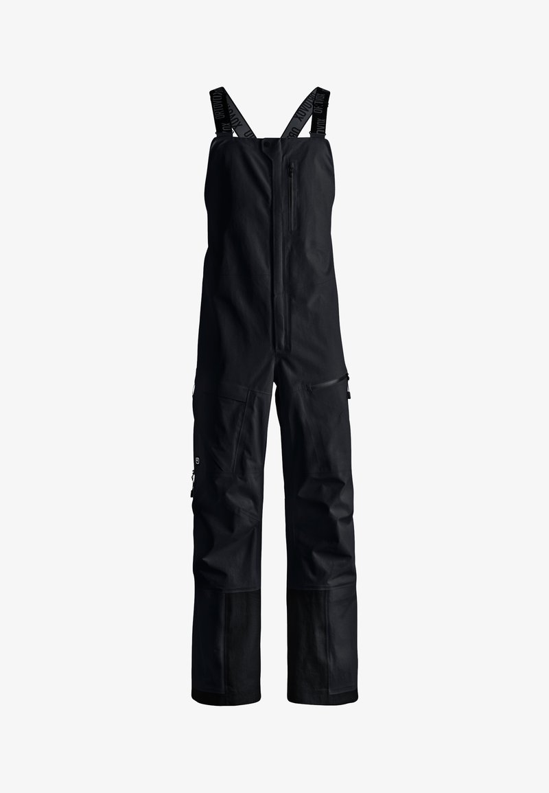 Schwarze wasserdichte Latzhose mit verstellbaren Trägern, Frontreißverschluss, mehreren Reißverschlusstaschen und verstärkten unteren Beinen. Strapazierfähiger Stoff.