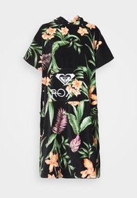Poncho da spiaggia nero con cappuccio, caratterizzato da motivi floreali e foglie vibranti in verdi e arancioni. Include una tasca frontale e un dettaglio con il logo Roxy.
