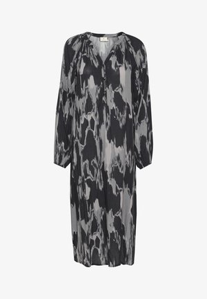 Duga, široka haljina u crnoj i sivoj apstraktnoj šemi. Izrađena od lagane tkanine s V-izrezom i dugmetom na prsima.