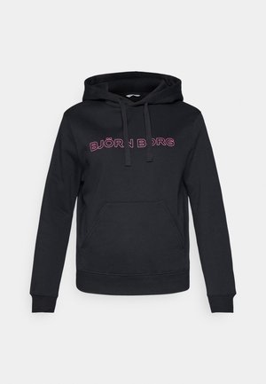 Svart hoodie i bomullsblandning med en framficka. Har en rosa "BJÖRN BORG" logotyp över bröstet och en huva med snörning.