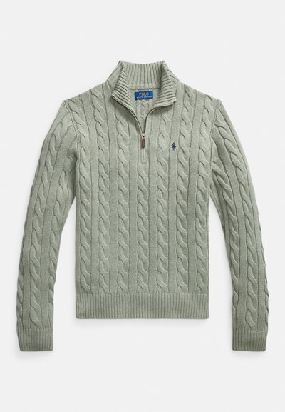 Light green cable-knit sweater with a zippered collar, ribbed cuffs, and hem. Features a small logo in navy on the chest.