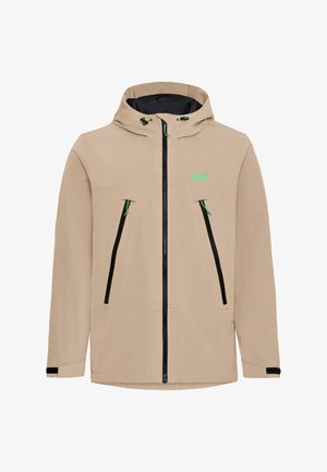 Beige jas met een ruitpatroon, zwarte ritsen en groene accenten. Voorzien van een capuchon en twee zakken aan de voorkant. Het materiaal lijkt lichtgewicht.