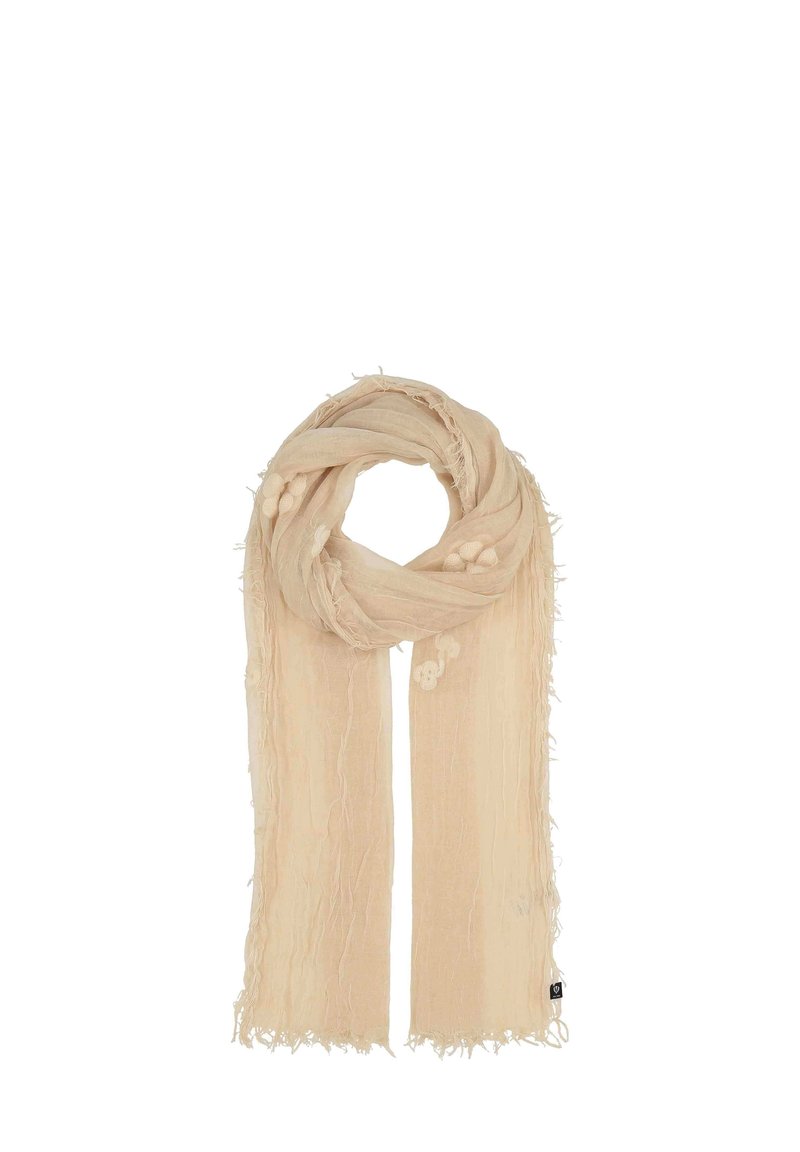 Écharpe beige clair avec une texture froissée. Les extrémités présentent des bords effilochés, et il y a des motifs brodés subtils le long du tissu.