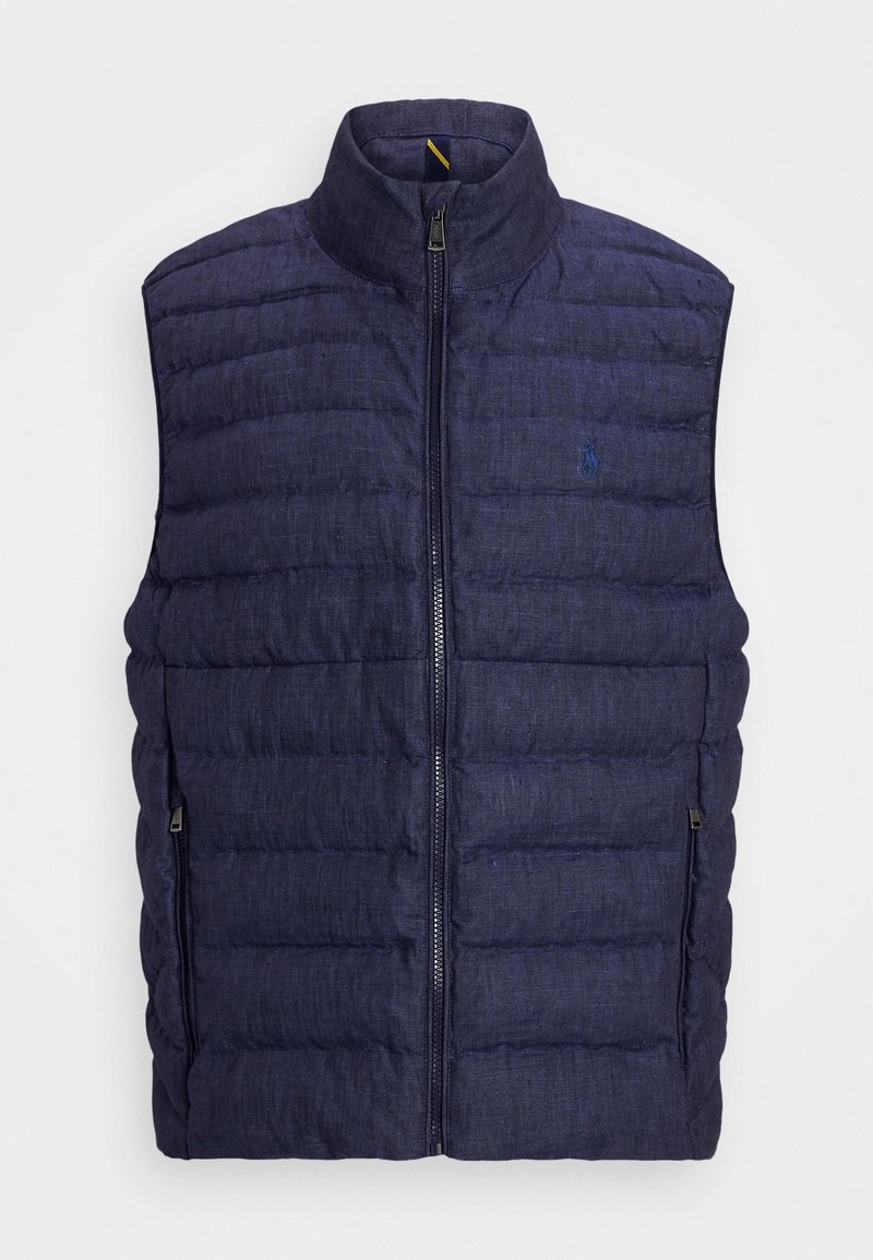 Navy blue puffer vest with a high collar, zip closure, and side pockets. Features a quilted texture and a small logo on the chest.