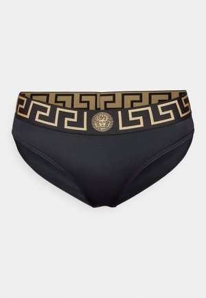 Mustat bikinit alushousut, joissa on kultaiset kuvioidut vyöt, joissa on kreikkalainen avainkuvio ja keskellä Medusa-embleemi. Silkkinen, joustava kangas.