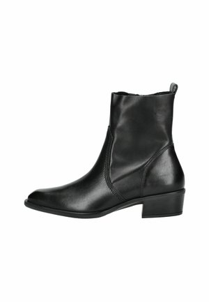 Botte de cheville en cuir noir avec un petit talon carré, un bout pointu et une finition lisse. Présente des coutures sur les côtés et une languette à l'arrière.