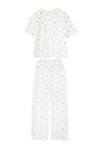 Biały bawełniany komplet piżamowy składający się z krótkiego rękawa i długich spodni, oba ozdobione drobnym kwiatowym nadrukiem w czerwonym i zielonym kolorze na całej powierzchni.