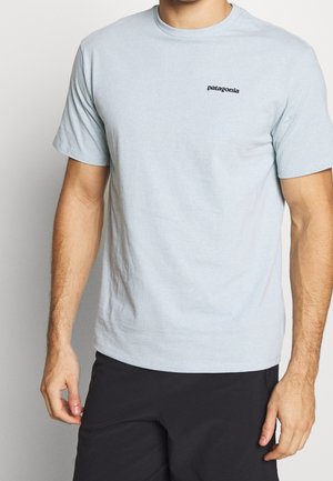 Triko s potiskem - light blue