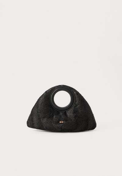 Black woven purse with a unique crescent shape, featuring a round handle and subtle logo detail at the front. Textured surface throughout.