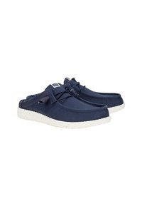 Marine canvas klompen met een wit gespikkelde zool, voorzien van een vetersluiting en een gewatteerde kraag voor comfort. De binnenkant heeft een patroonontwerp.