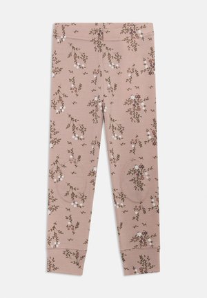Leggings roses en matière douce, ornées d'un motif floral avec des fleurs blanches et violettes, une taille élastique et une coupe ajustée.