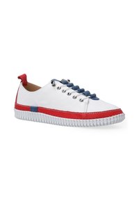 White canvas sneakers with red accents, blue laces, and a rubber sole. Features silver eyelets and a stitched design along the sole.