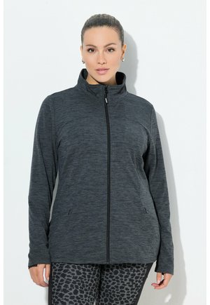 Dark gray zip-up jacket with a high collar, textured fabric, side pockets, and fitted design, paired with animal print leggings.