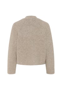 Beige kortärmad tröja i mjukt, texturerat tyg med långa raglanärmar och rund halsringning; har inga stängningar eller mönster.