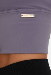 SQUATPROOF REPOSE ACTIVE  - Top - purple quartz
