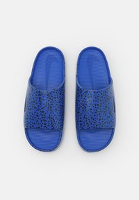 Nike Sportswear CALM SLIDE UNISEX - Sandály do bazénu - racer blue/dark obsidian